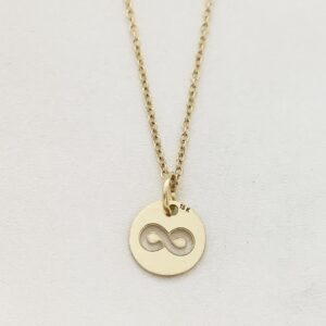 Dije placa infinito oro 18k
