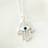 Collar mano poderosa con ojo turco plata