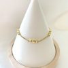 Pulsera bolitas diseño regulable oro 18k
